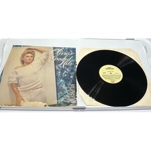 Vinyl Record with Album Cover Olivia’s Greatest Hits
